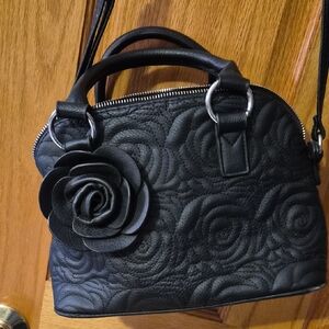 Black Quilted Handbag with Floral Design
